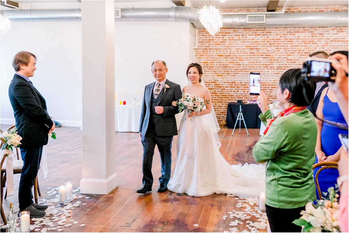 bride with father walking down the aisle