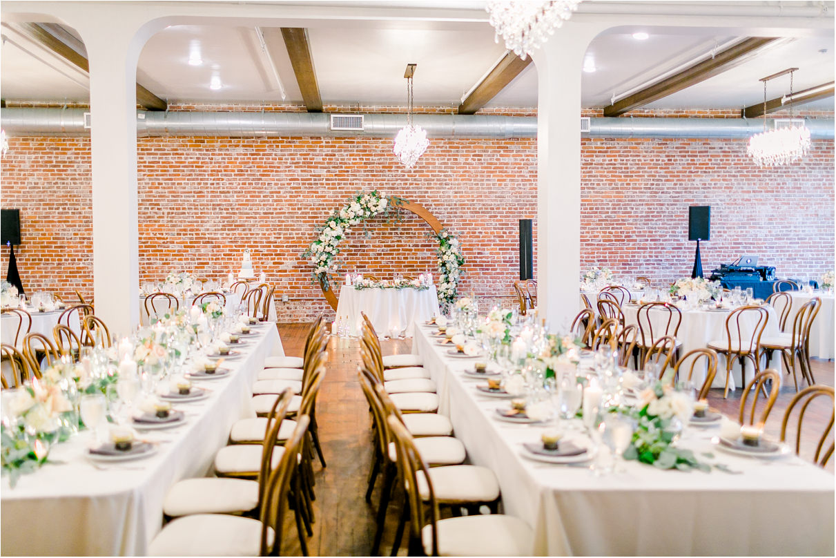 wedding reception room with long tables