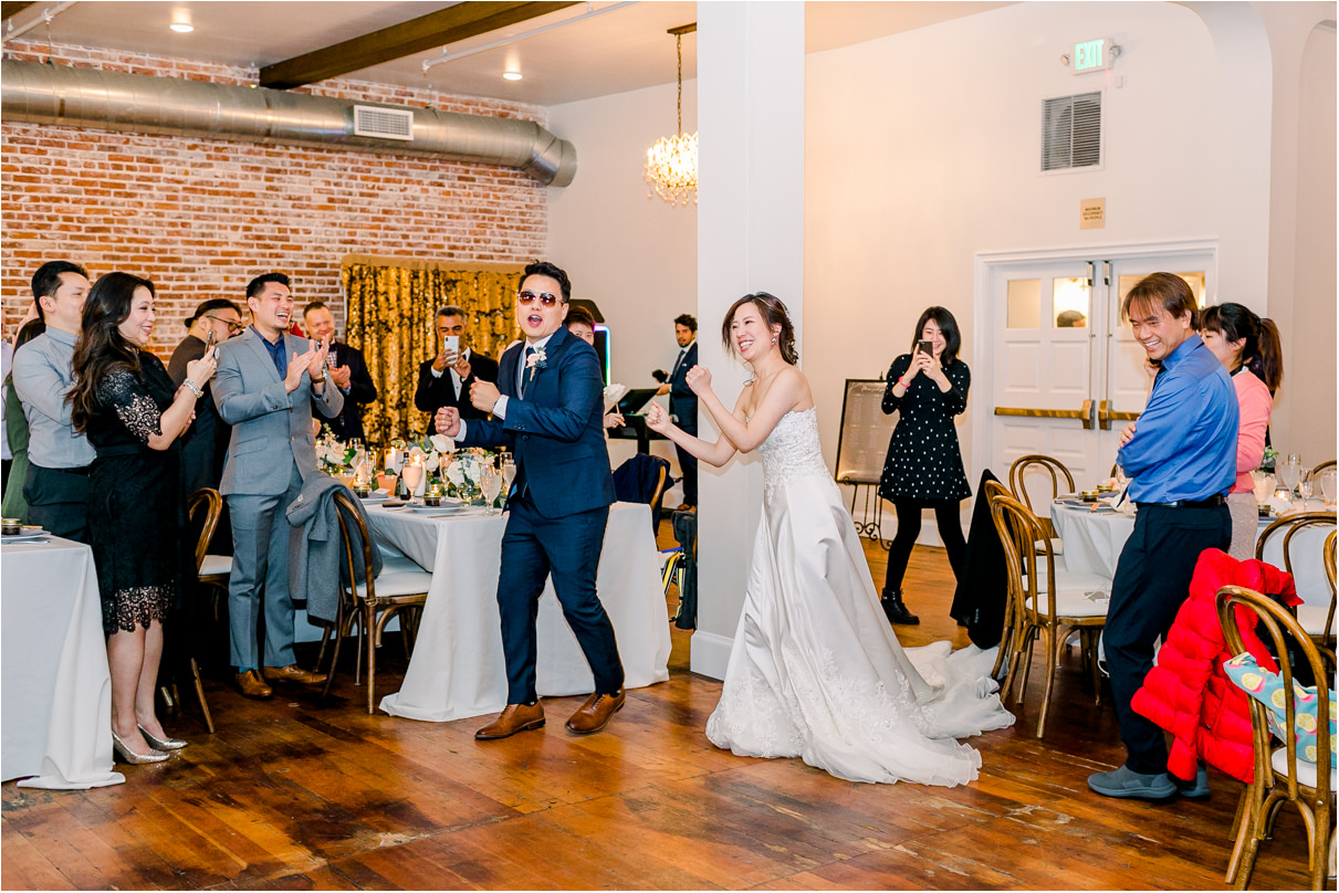 bride and groom dancing into reception for grand entrance