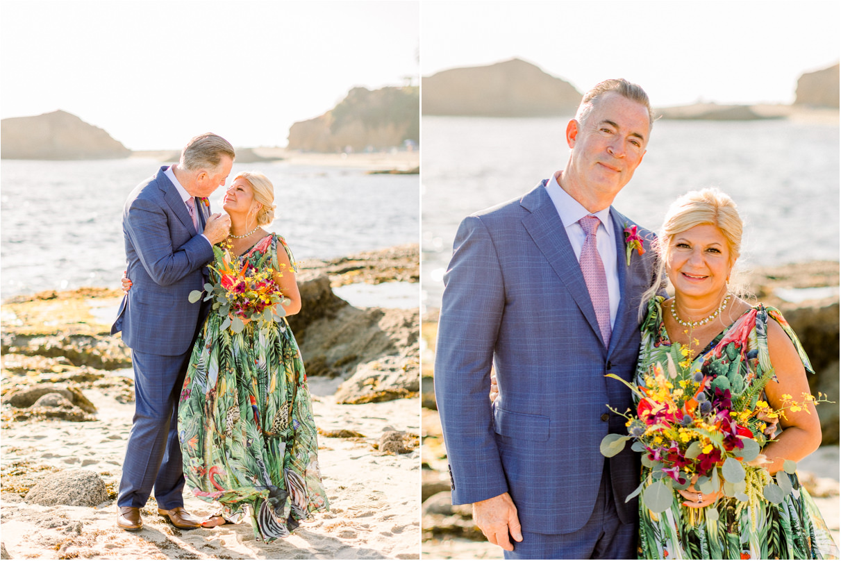 Bride and groom in colorful clothes smiling at camera