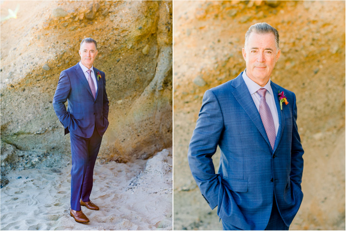 Man in blue suit looking at camera looking suave