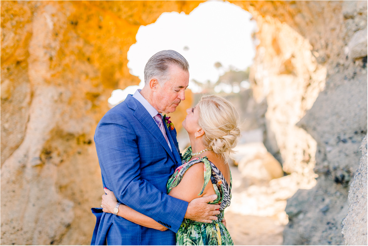 Bride and groom holding each other staring into each others eyes