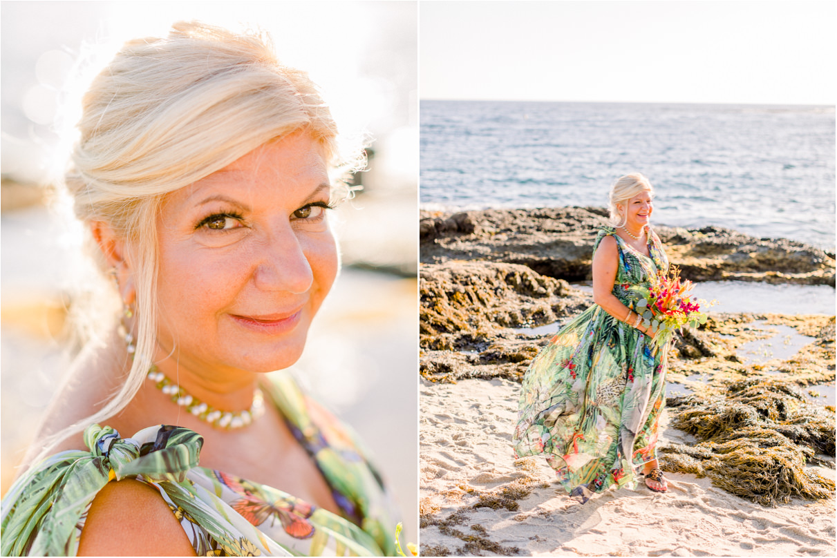 Bride at the beach in colorful dress holding bouquet 