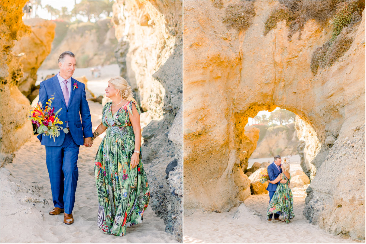 Bride and Groom walking with colorful bouquet at sunset at Montage Beach under large rock arch