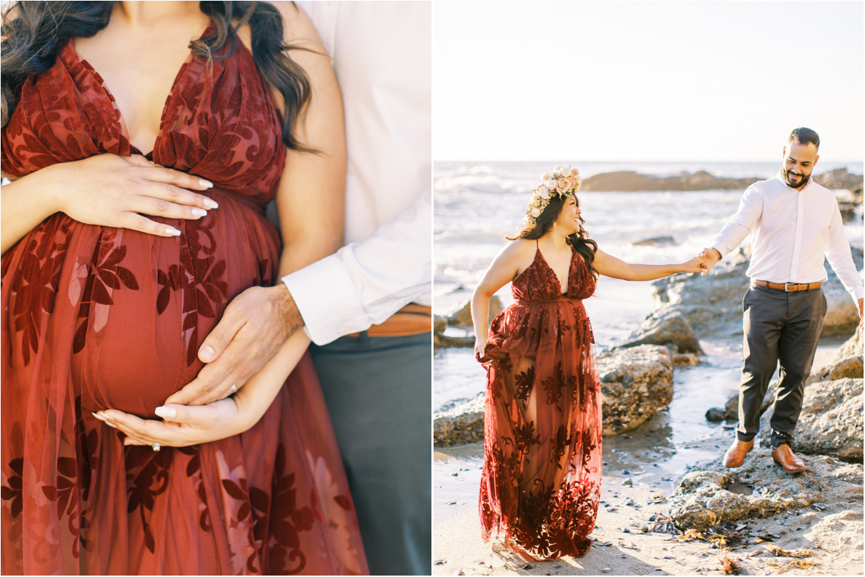 Pregnant woman holding her belly and walking with husband at the beach