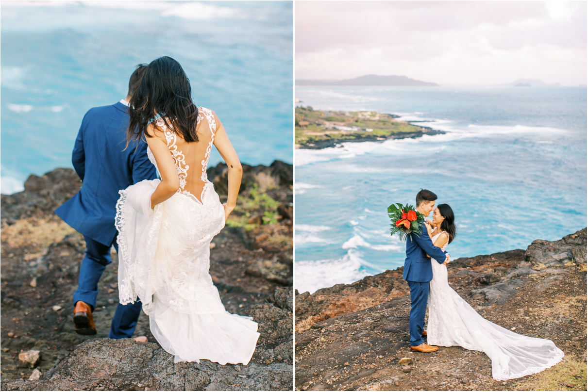 bride and groom walking down to ocean lookout with bright blue water