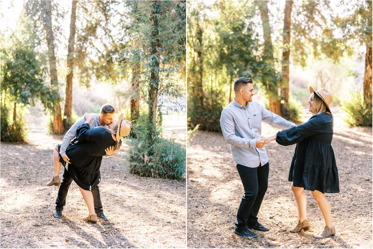 Couple dancing and kissing in forest
