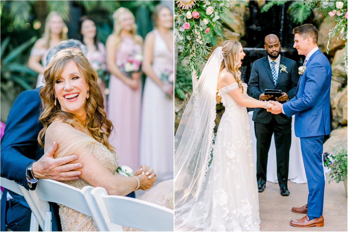 Bride laughing at groom holding hands and mother of the bride smiling