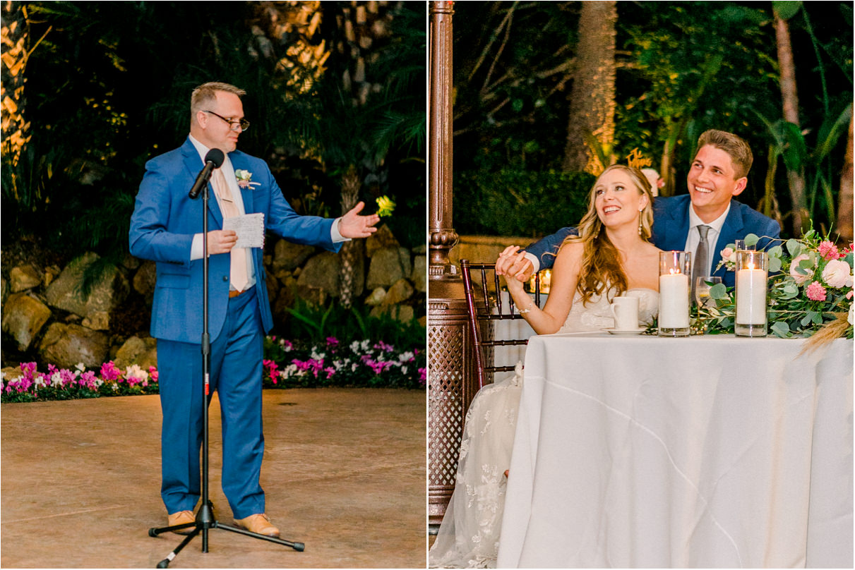 Couple smiling as wedding guest gives speech during reception