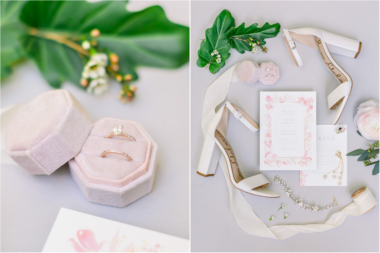 Wedding invitation with bridal heels, jewelry, rings and green leaves