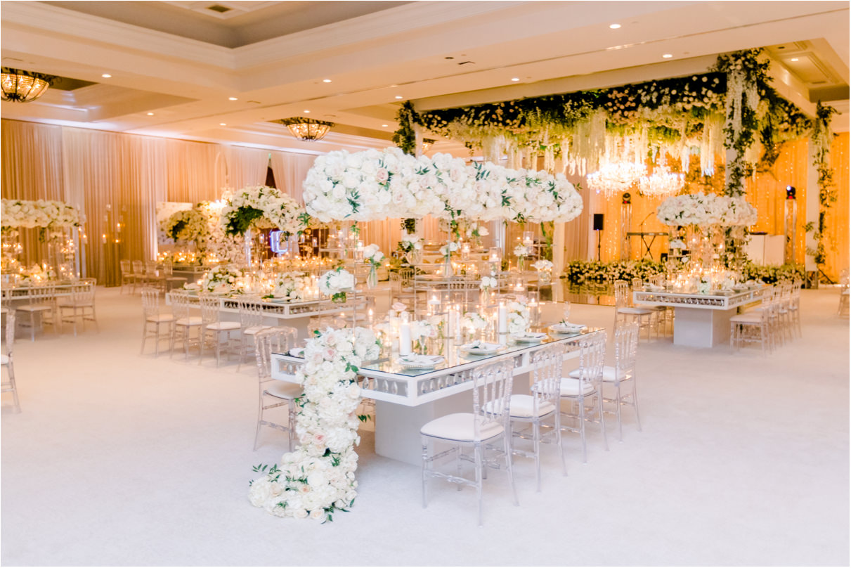 Wedding reception table with white roses