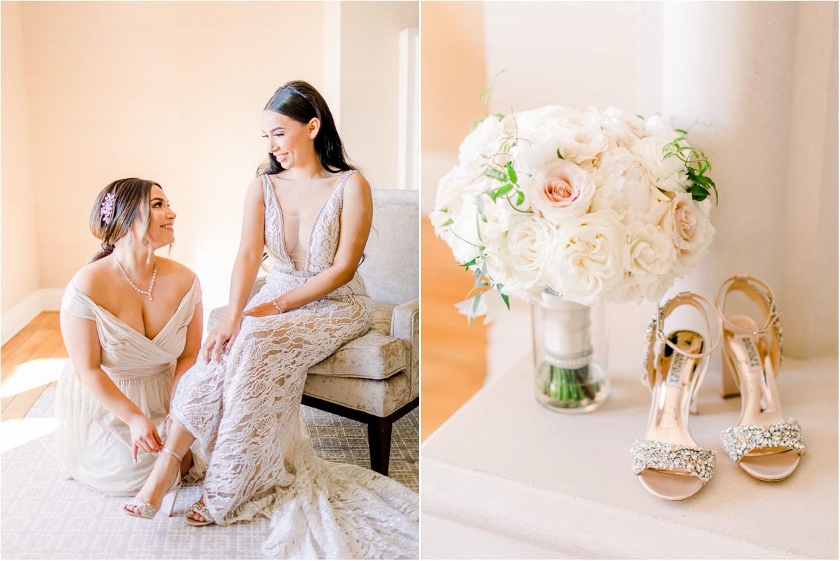 Bridesmaid helping bride put on shoes in a hotel room