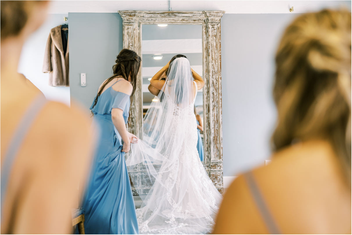 Bride getting ready in bridal room at Huntington Bay Club
