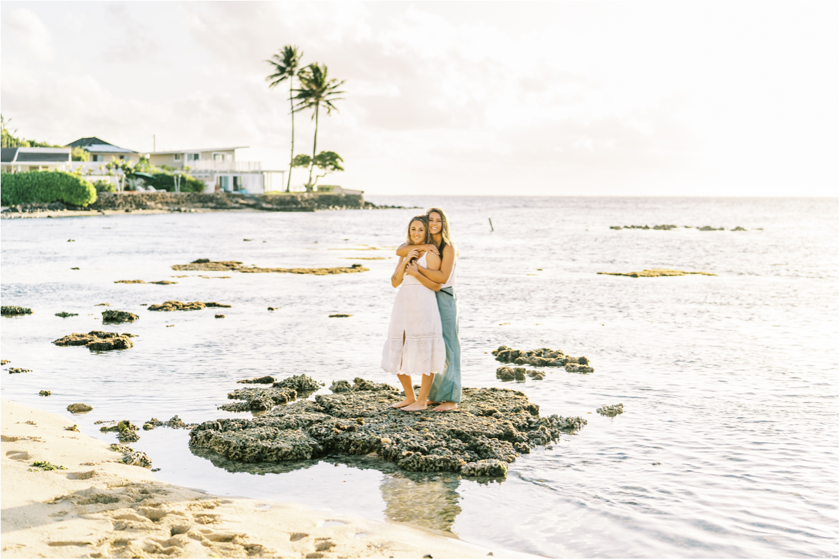 Beach Engagement Session lesbian couple in hawaii on reef at low tide