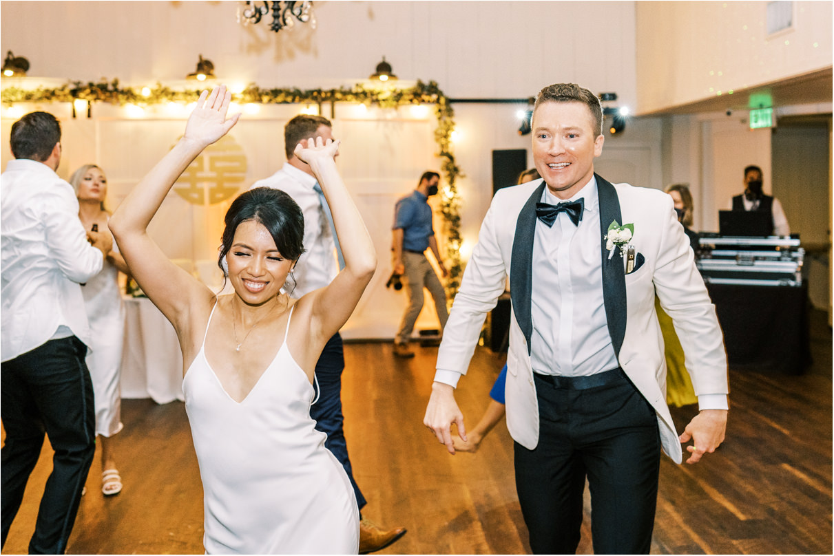 Bride and groom dancing at wedding reception