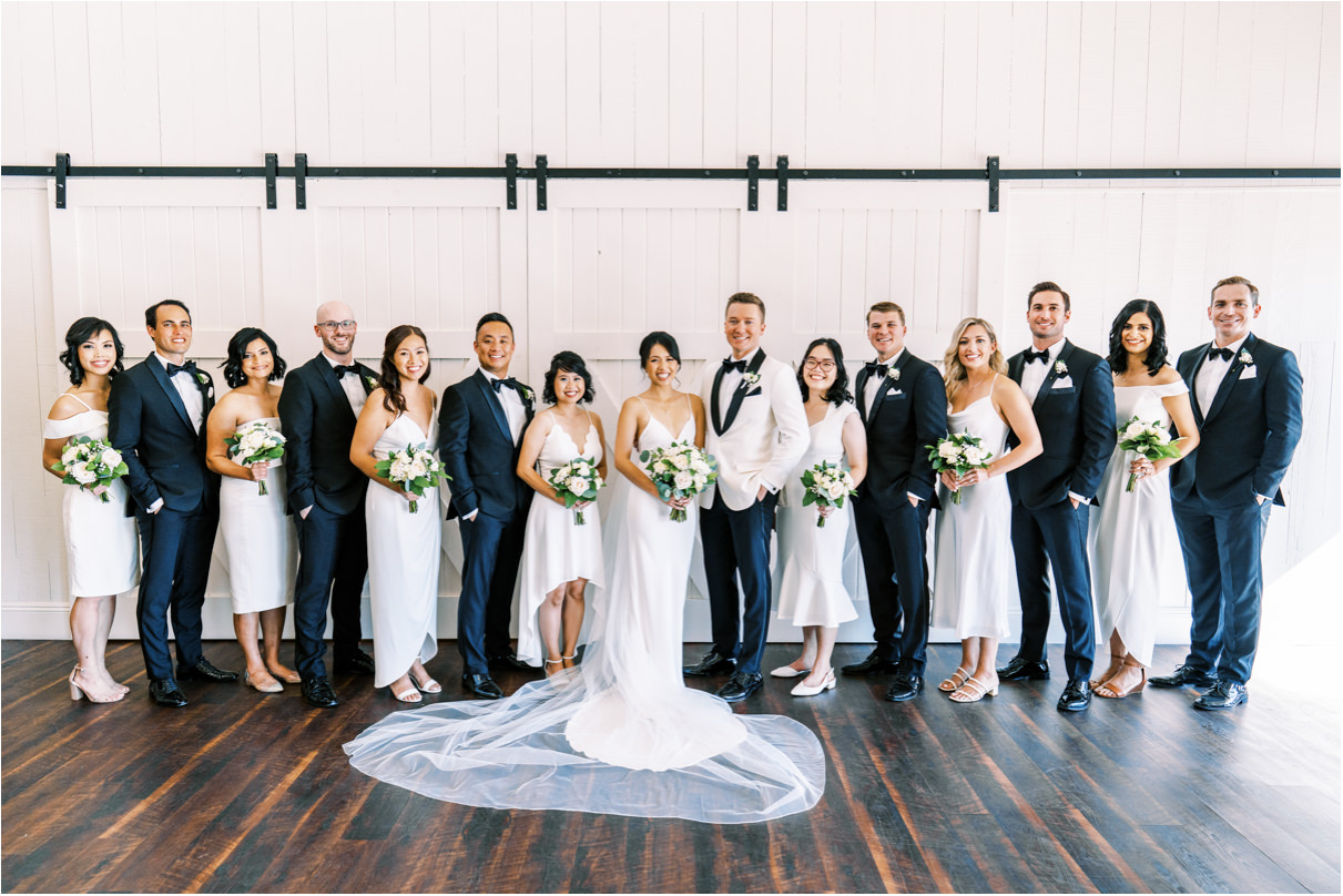 Full wedding party in black and white