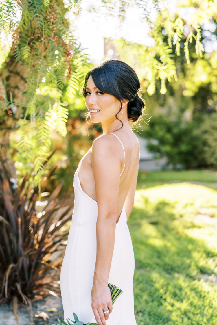 Bride in backless dress