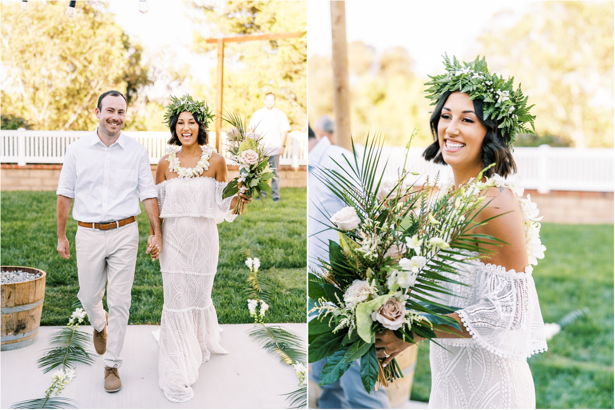 Bride and groom walking down aisle and smiling