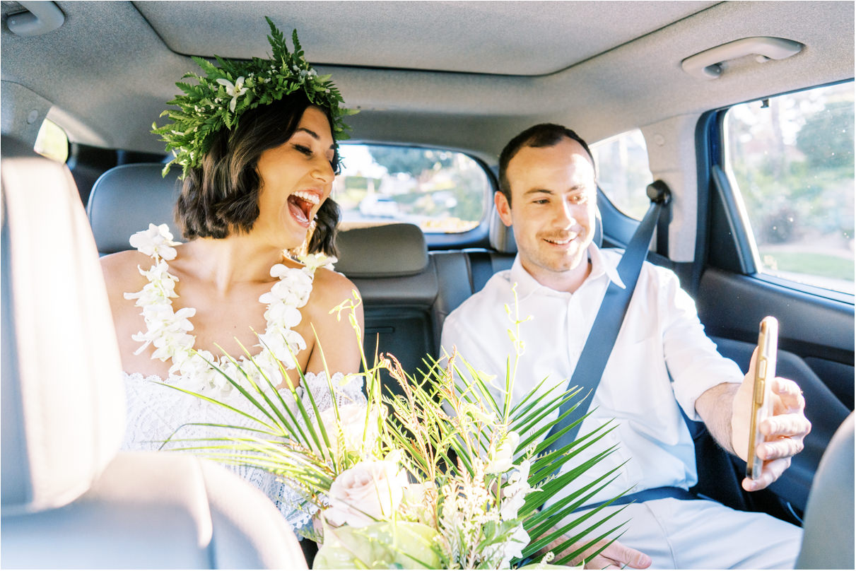 Bride and groom facetiming friends after wedding