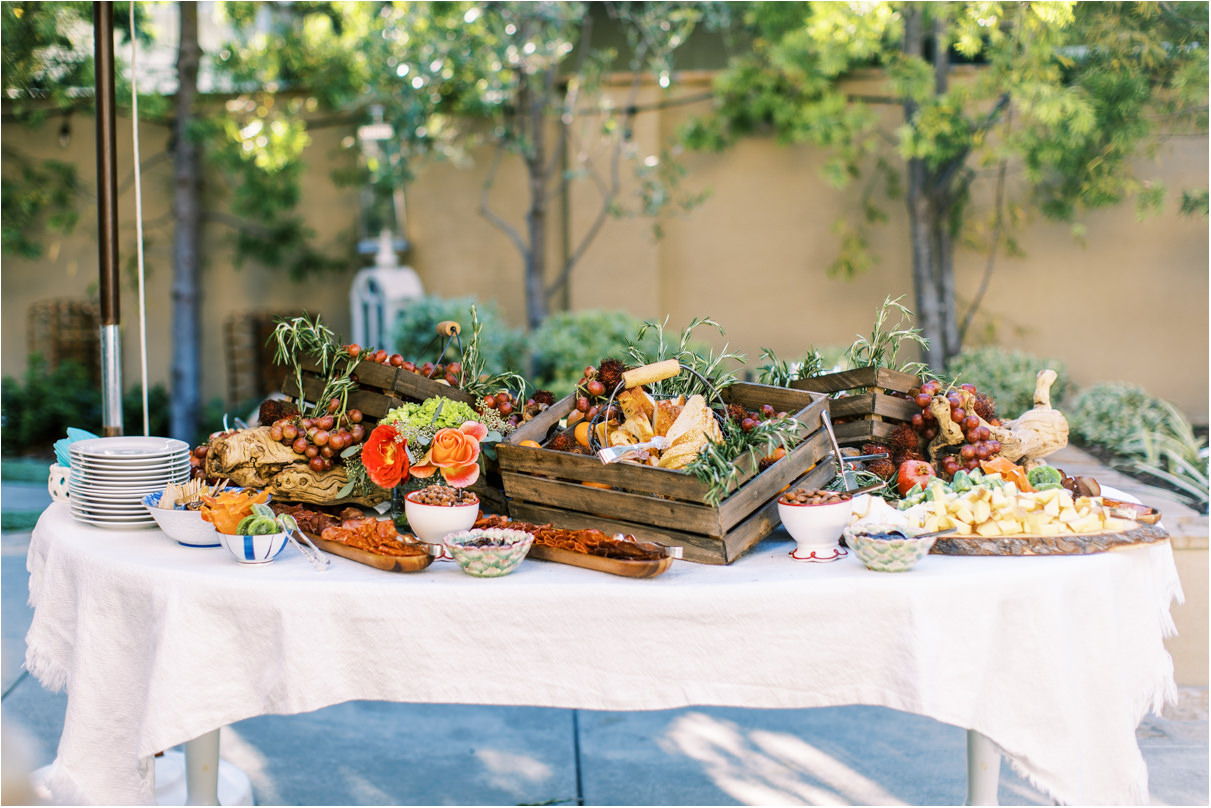 charcuterie table overflowing with food