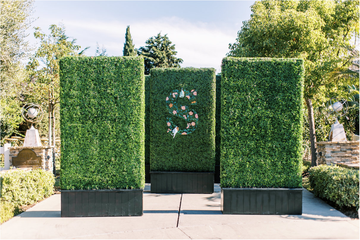 backyard wedding idea hedge in driveway