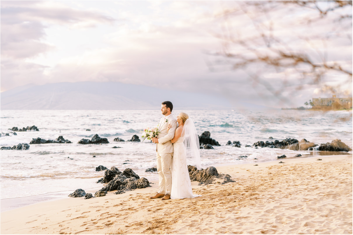 bride and groom on Maui beach at sunset