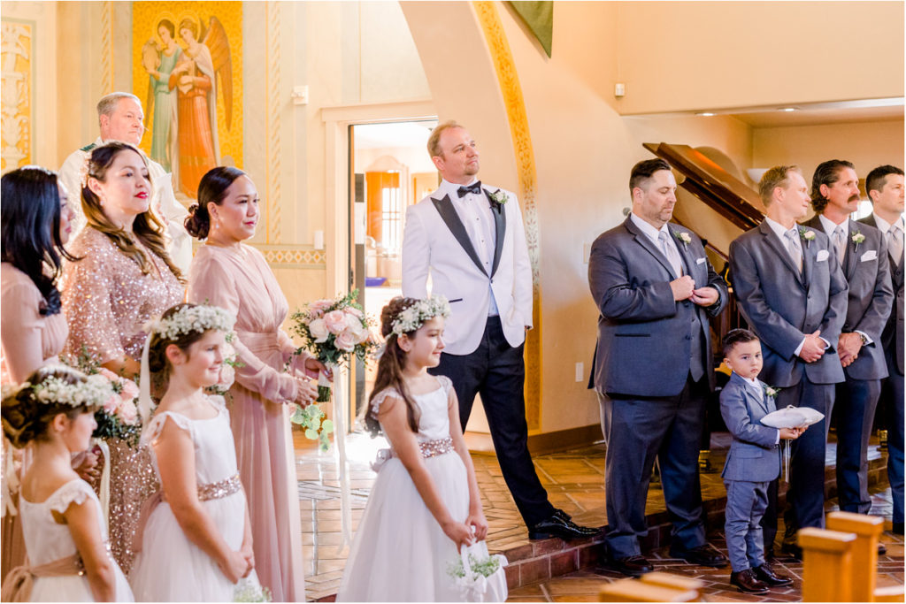 Groom waiting at altar