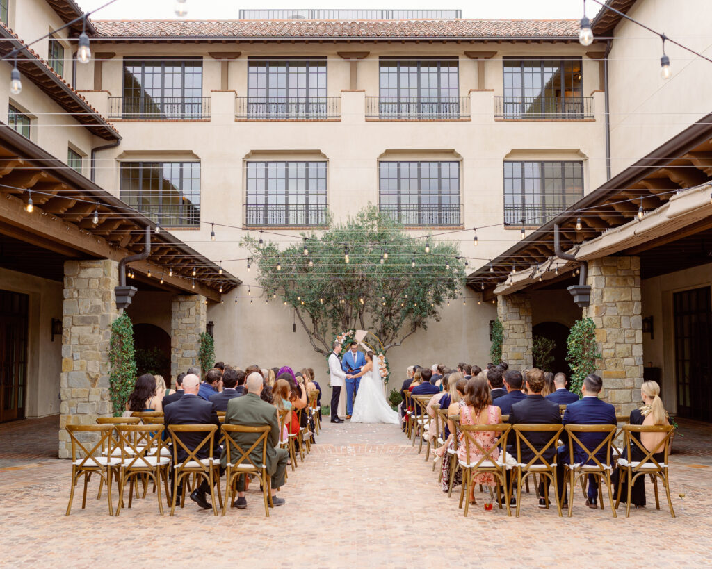 Outdoor wedding ceremony at The Inn at the Mission in San Juan Capistrano